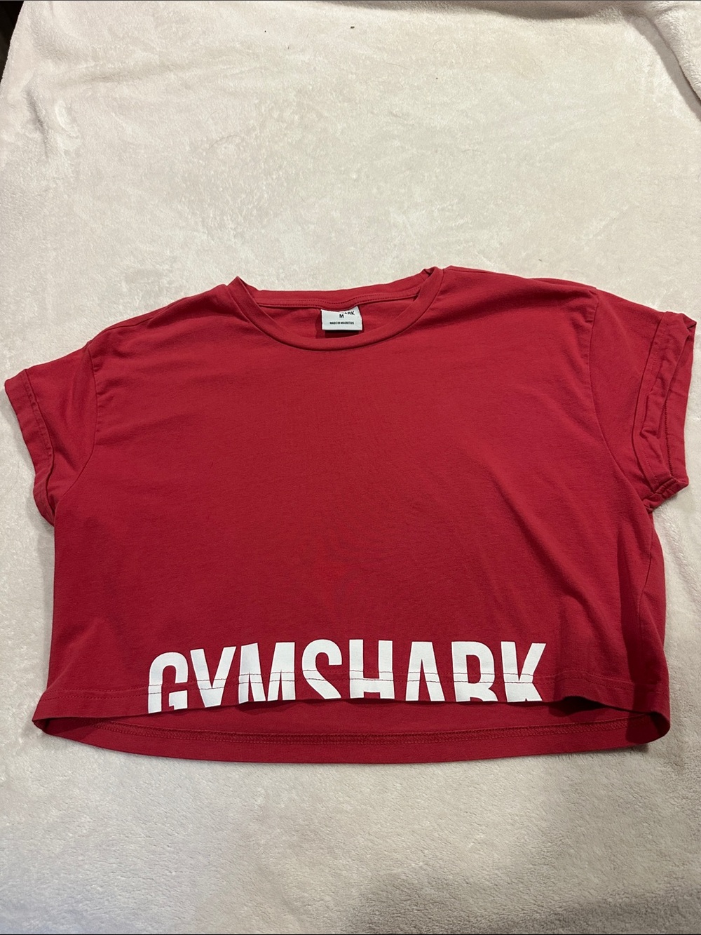 Gymshark light fascia or burgundy Cropped top size M